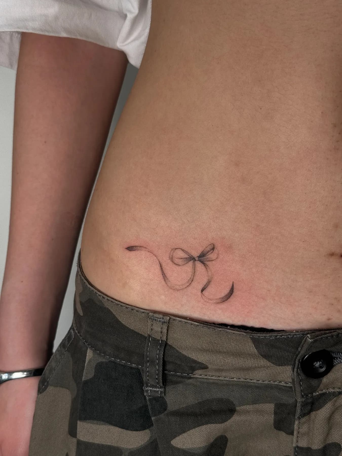 Tattoo by Nisa, fine line