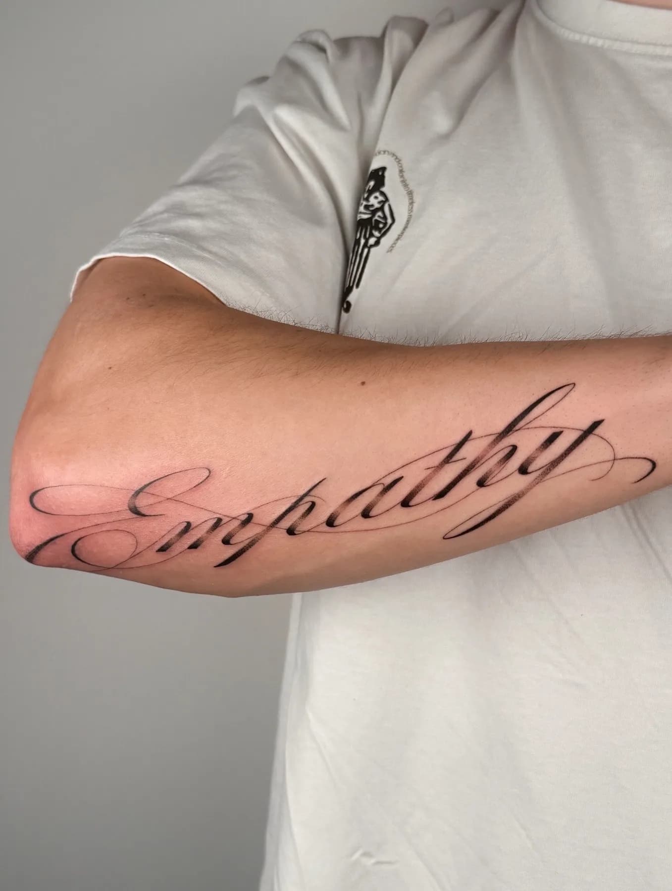 Tattoo by Nisa, script