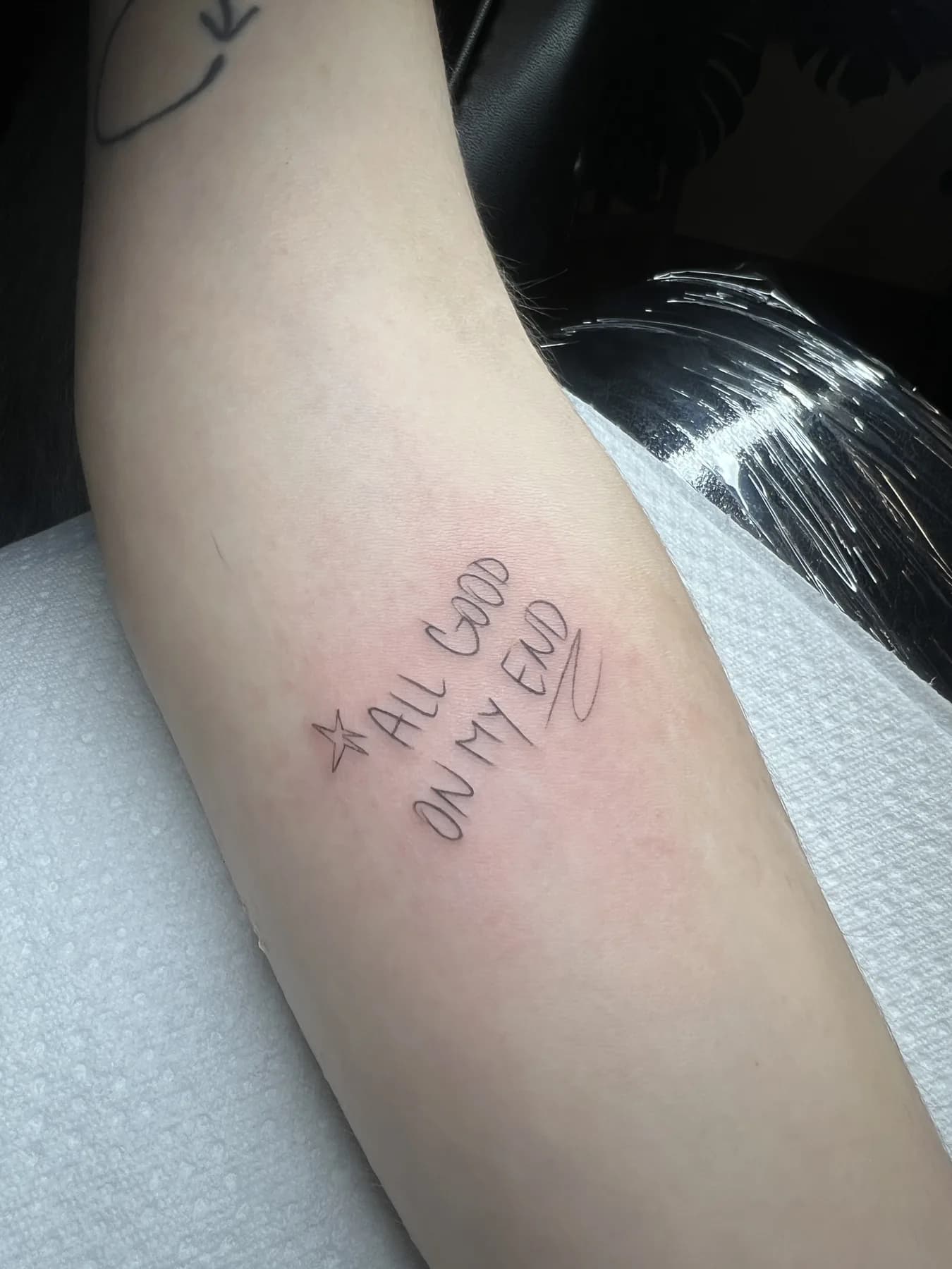 Tattoo by Nisa, script