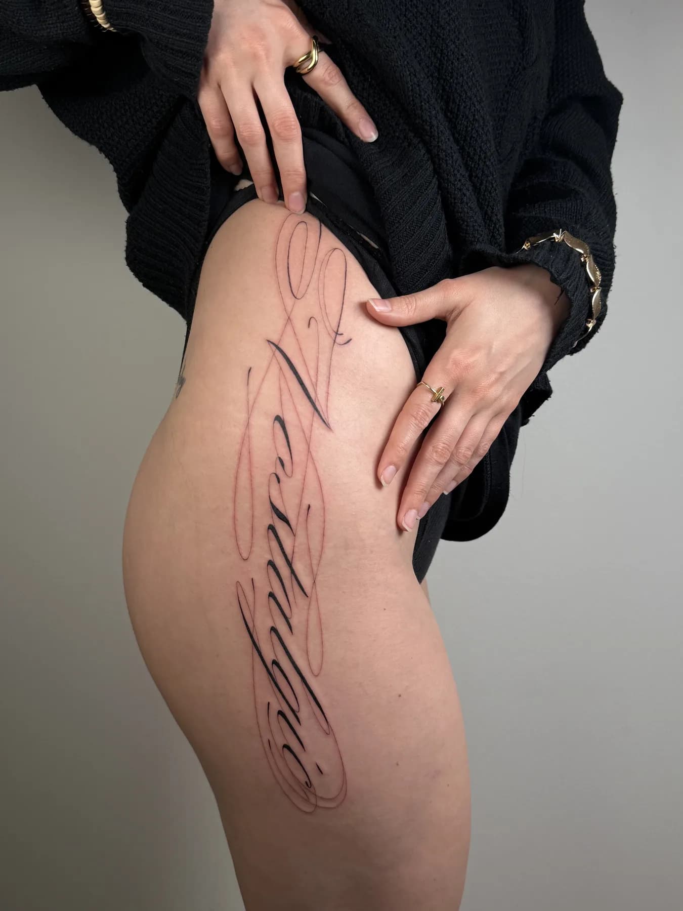 Tattoo by Nisa, script