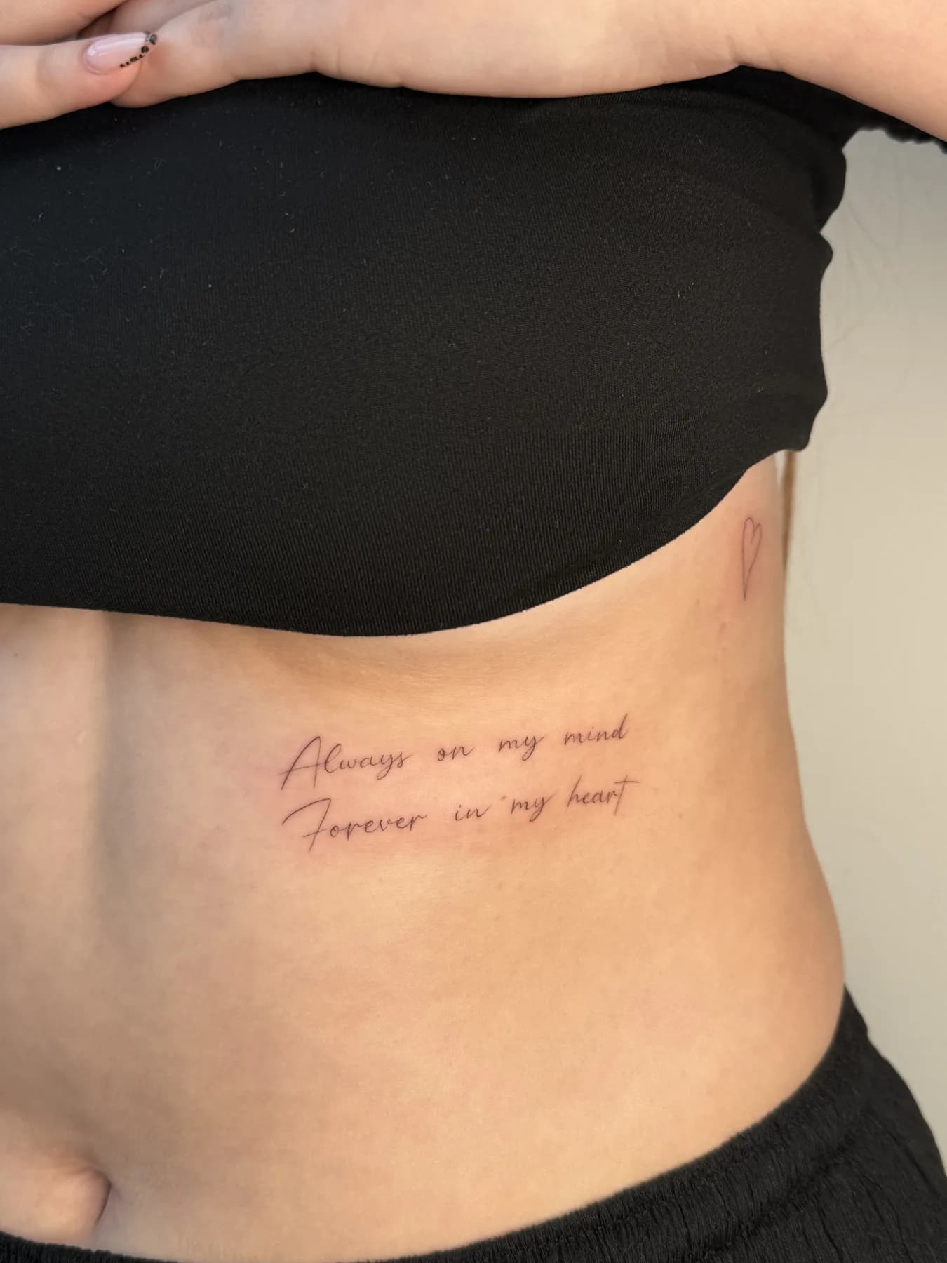 Tattoo by Nisa, script