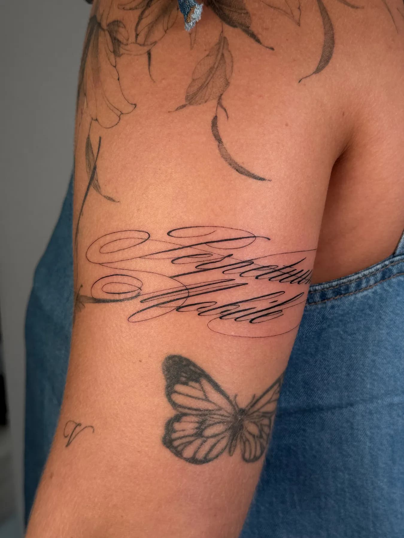 Tattoo by Nisa, script