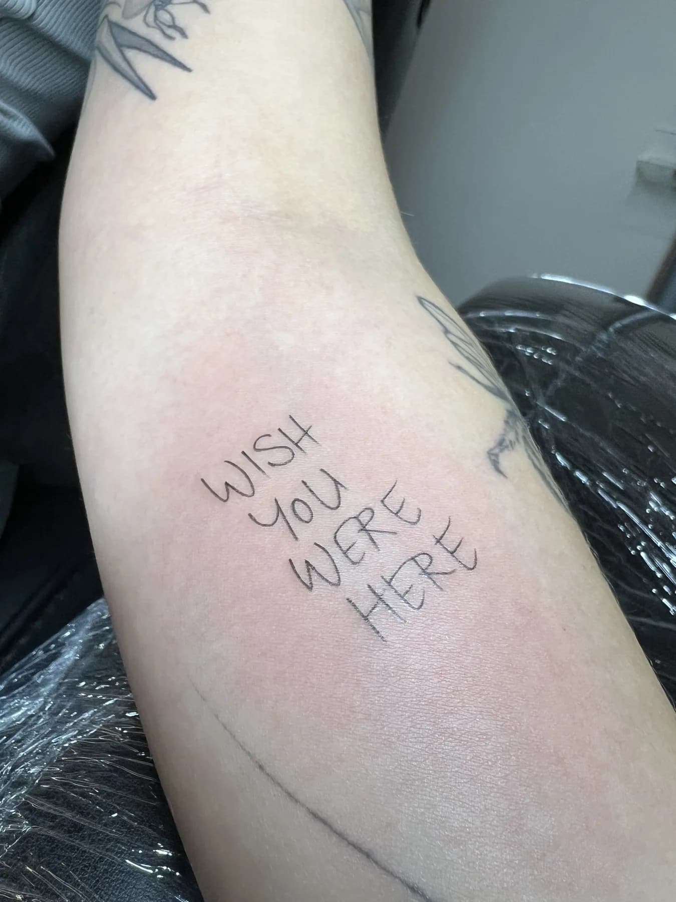 Tattoo by Nisa, script