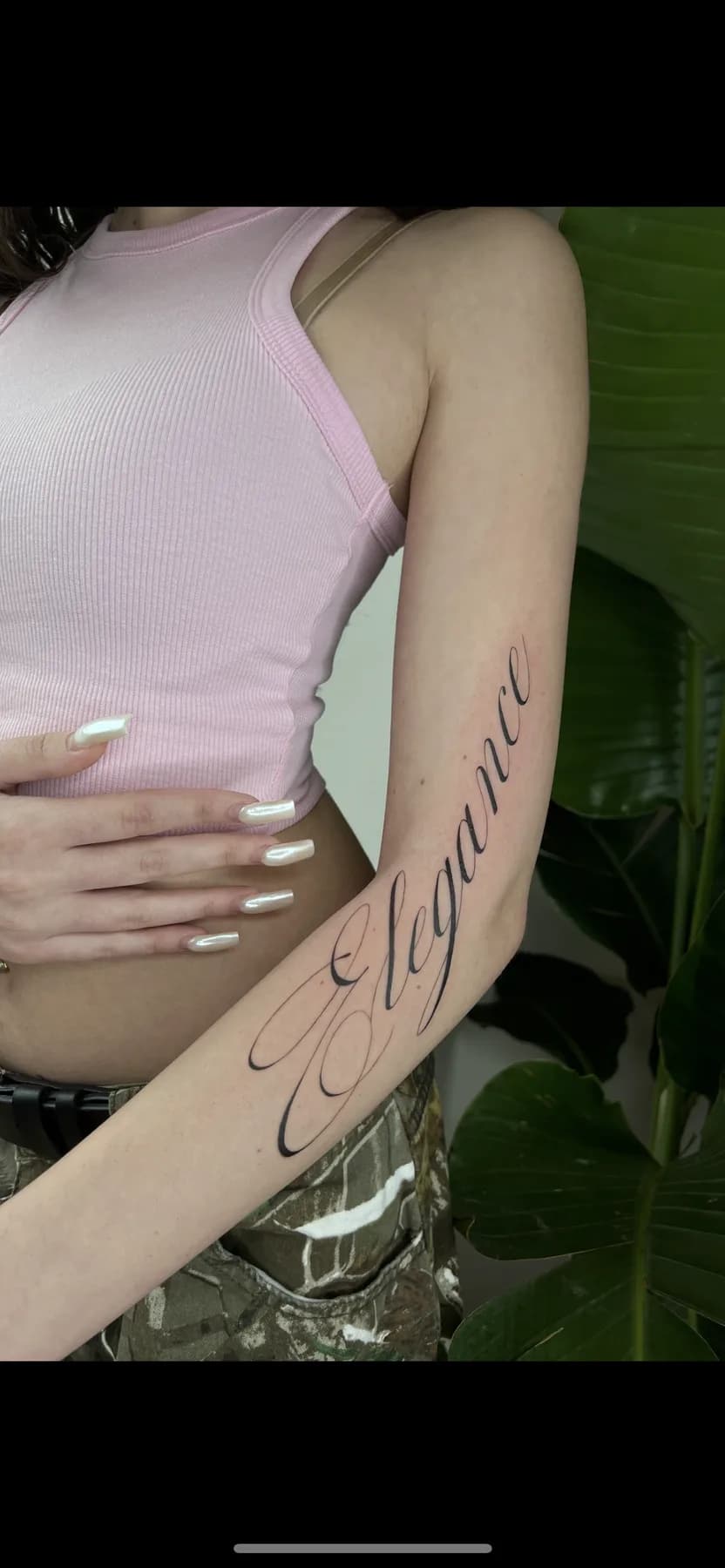 Tattoo by Nisa, script